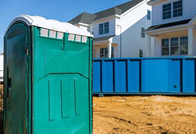 porta potties on a busy job site, providing necessary facilities